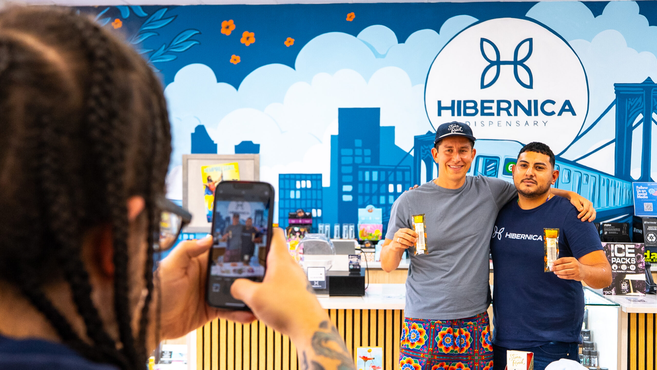 Community atmosphere inside Hibernica Bronx dispensary with locals shopping